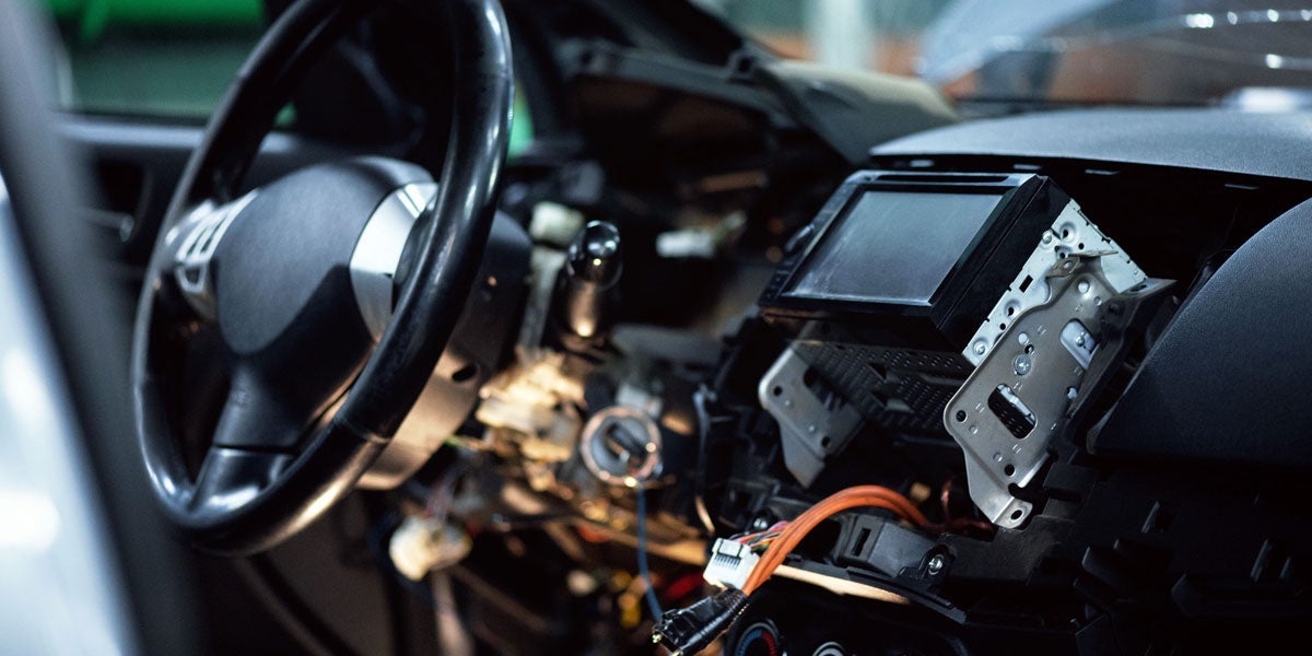 Detail of vehicle electrical system being serviced